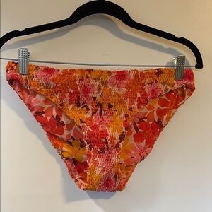 Free People Red and Orange Bikini with Artistic Floral Design